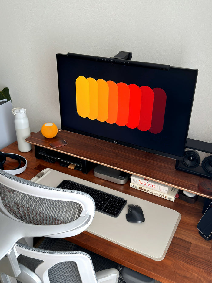 A clean, modern minimalist home office desk setup