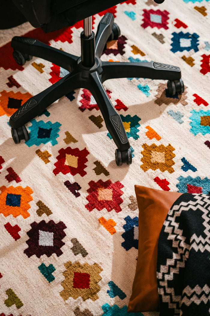 A comfortable office chair with a soft seat cushion